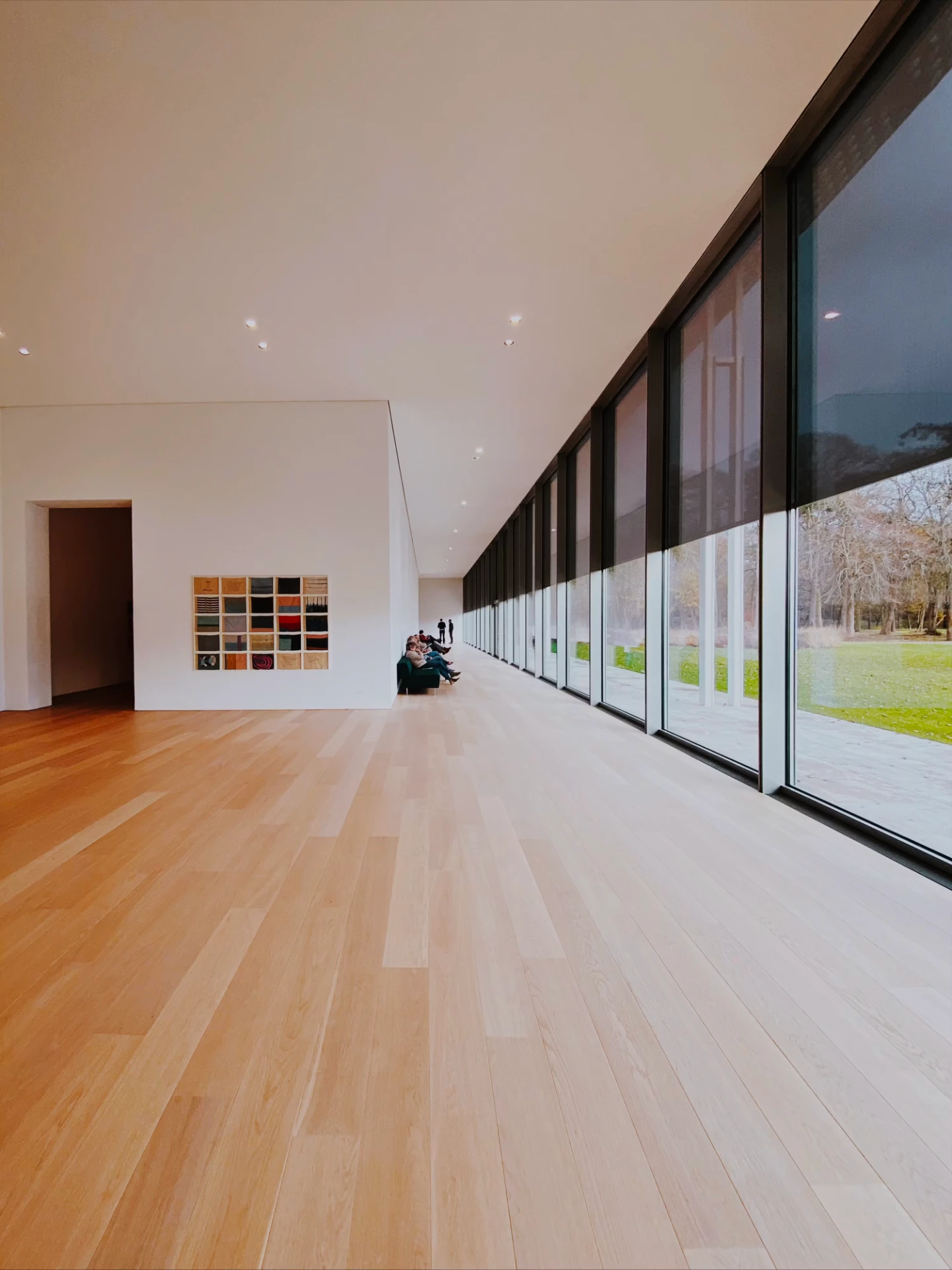 Light hardwood flooring installed in a bright modern room